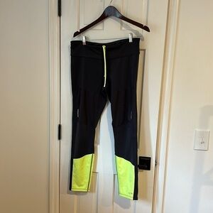 Lightly used champion work out leggings grey and neon yellow size L